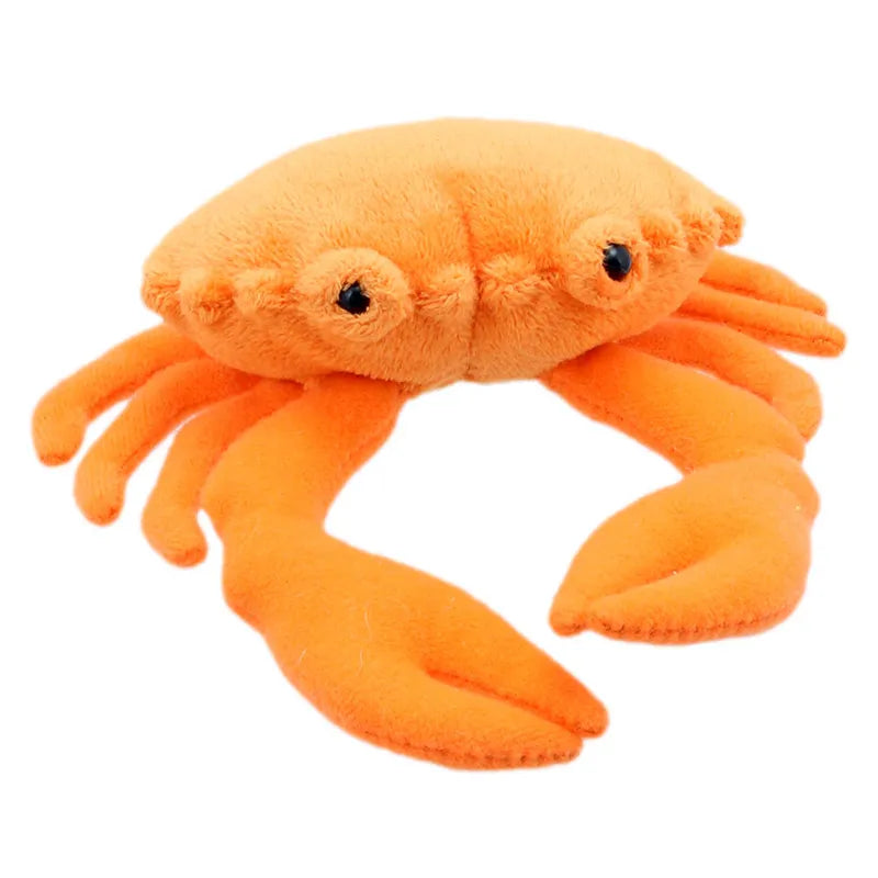 Introducing The Puppet Company Crab Finger Puppet, a soft and plush orange crab with big eyes, six legs, and two claws crafted from fuzzy fabric. Designed in a simple and cute style, this charming creation features stitched details for added texture.