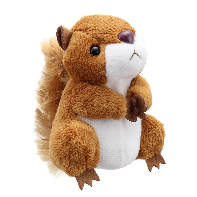 The Puppet Company Red Squirrel Finger Puppet is a plush storytelling toy with a fluffy tail, brown and white fur, black eyes, a small purple nose, and tiny front paws. It sits upright and doubles as a finger puppet to bring stories to life.