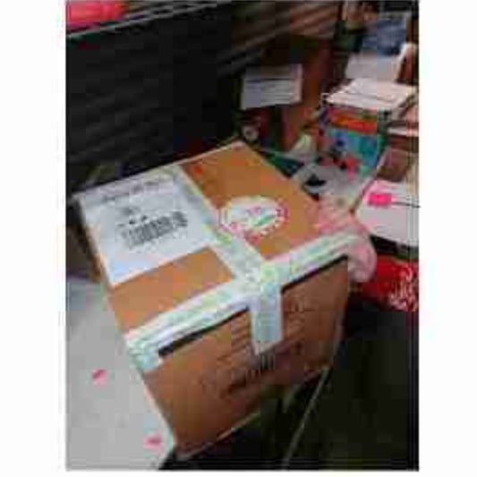 Mimitoys ready to go to An Post in a recycled box