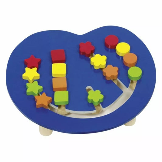 A blue wooden Colour Assorting Board with a number of wooden toys on top of it.