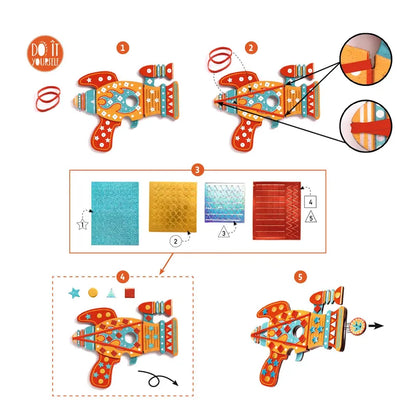 A step-by-step guide for assembling the Djeco Mosaics & Stickers Kosmik toy gun. Steps 1-3 show attaching components from the creative kit. Step 4 involves adding mosaic stickers and decorative elements. Step 5 displays the completed toy gun, predominantly orange with blue and red accents.