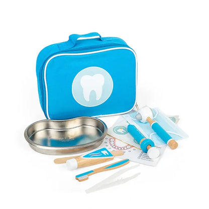 The Bigjigs Dentist Kit is a blue toy dental kit with a tooth-icon carrying case, containing a metal tray, toothbrush, toothpaste, dental mirror, tweezers, and dental tools neatly arranged in front.