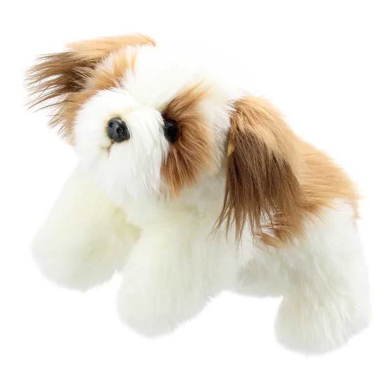 The Puppet Company Full-bodied Hand Puppet Dog is a fluffy, white and brown soft toy with long, silky fur and floppy ears, shown facing slightly to the left against a plain white background.