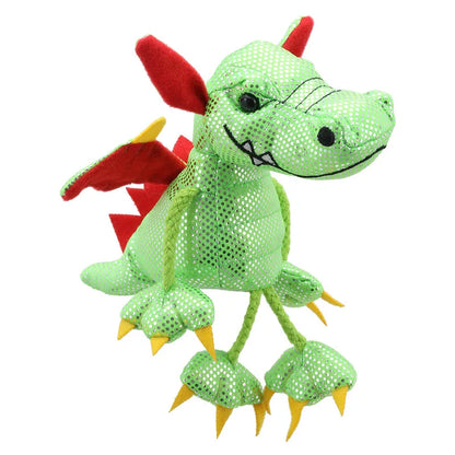 The Puppet Company Dragon Finger Puppet Green is a soft green dragon with shiny, dotted fabric, red wings and ears, yellow claws, a stitched black smile, and dangling rope arms and legs—perfect for playful storytelling adventures.