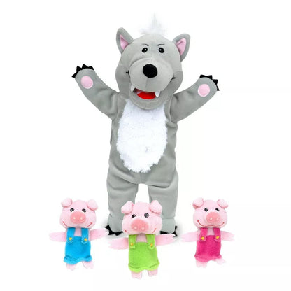 a Fiesta Crafts Big Bad Wolf & 3 Little Pigs Puppet Set with three small pigs in front of it.