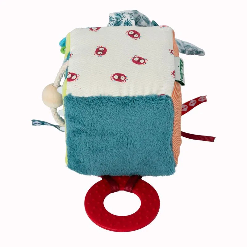 The Lilliputiens I'm Discovering Jack Activity Cube is a delightful baby gift with colorful textures like soft blue fur and cute red owl fabric, featuring a red teething ring and sensory materials with side loops—perfect for a baby's first toy.