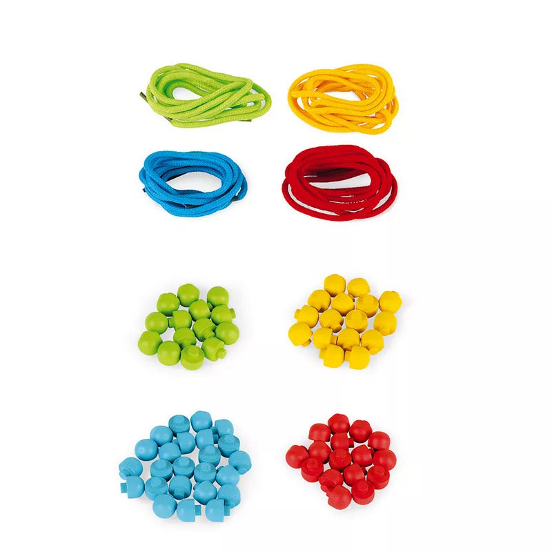 A Janod Lacing game with different colored beads and cords.