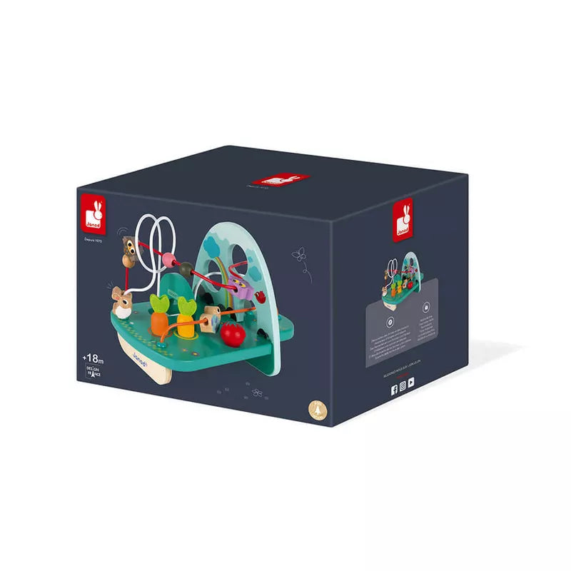 A Janod Rabbit and Co Looping Toy inside of it.