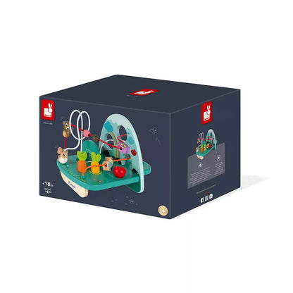 A Janod Rabbit and Co Looping Toy inside of it.