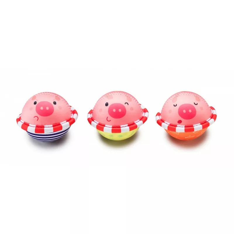three Lilliputiens Nicolas Bath Toys on a white background.