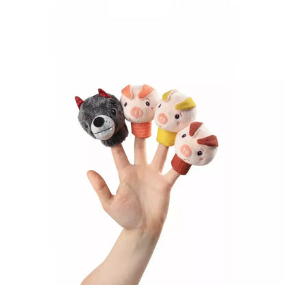 A hand adorned with four Lilliputiens Louis The Wolf And The 3 Little Pigs finger puppets, ready to tell a classic tale.