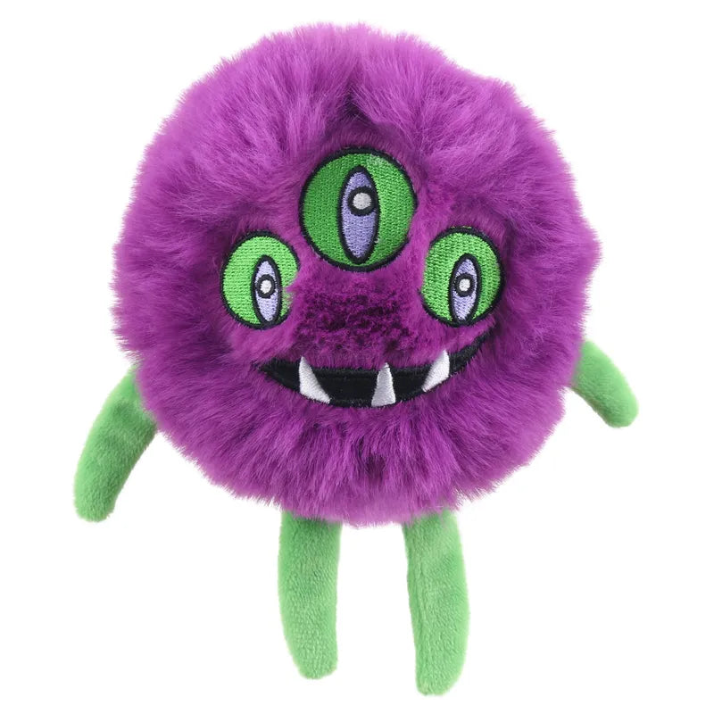 The Orbix Micro Monster Finger Puppet by The Puppet Company is a plush purple creature with three green eyes, white fangs, and four green legs—perfect for imaginative play. Shown against a white background.
