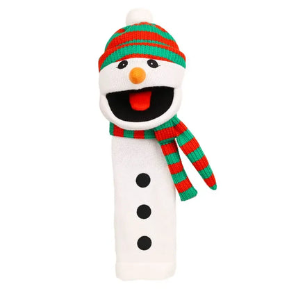 The Puppet Company Sockette Snowman is a charming sock puppet featuring a red and green striped hat, matching scarf, carrot nose, black button eyes, and three black buttons down the front. Crafted from recycled materials, this playful puppet has an open mouth with a cheerful expression—making it a delightful Christmas gift for kids or anyone young at heart.