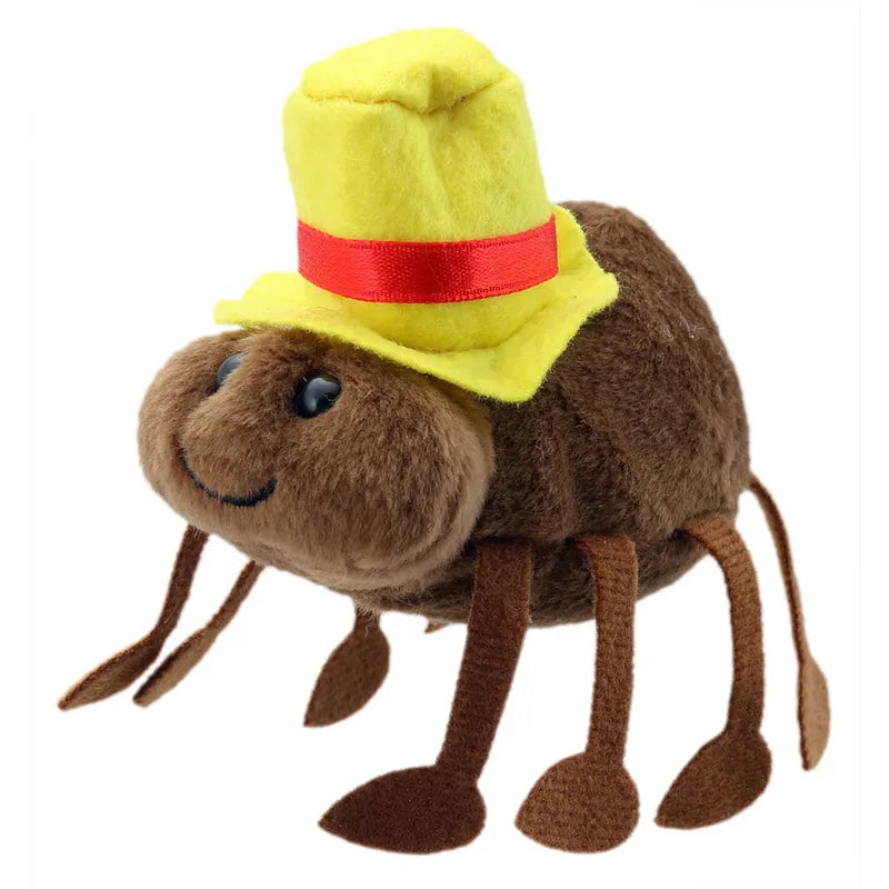 Introducing The Puppet Company Incy Wincy Spider Finger Puppet: This plush spider toy features a fluffy brown body, bright blue eyes, and a wide smile. Ideal for storytelling, it sports a vibrant yellow hat with a red ribbon and has eight thin, flat legs. This soft toy adds charm to any playful adventure!
