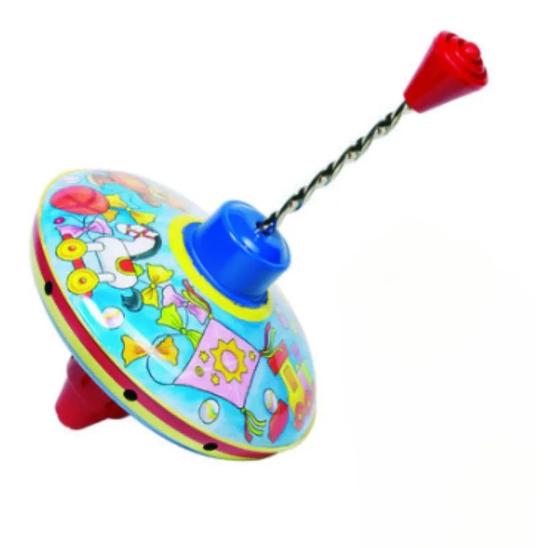 The Spinning Top Traditional features red handles and colorful designs of balloons, birds, and kites on its tin body. Positioned at an angle on a white background, this vibrant toy is sure to delight children.