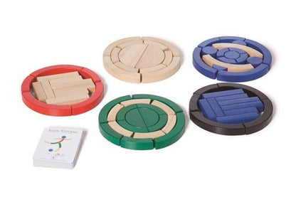 The Buitenspeel Sport Blocks Puzzle Game features five sets of round wooden pieces in red, natural, blue, green, and black arranged in circles with a deck of cards beside them for an engaging educational activity.