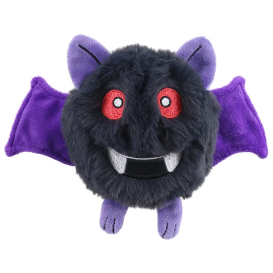 The Swoop Micro Monster Finger Puppet by The Puppet Company is a round, fluffy black plush with red eyes, white fangs in its smile, purple bat wings and ears, and small purple feet—your perfect cuddly companion on a white background.