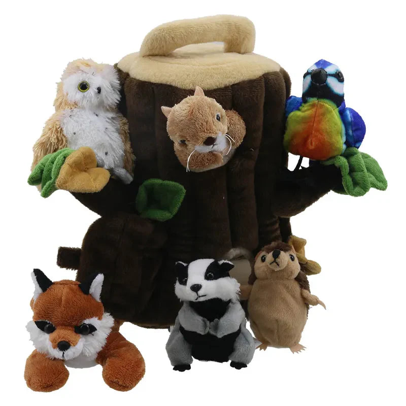 The Puppet Company Hide Away Tree House includes a plush tree stump with a handle and six woodland finger puppets—owl, bluebird, fox, badger, squirrel, and mouse—for interactive play and imaginative fun.
