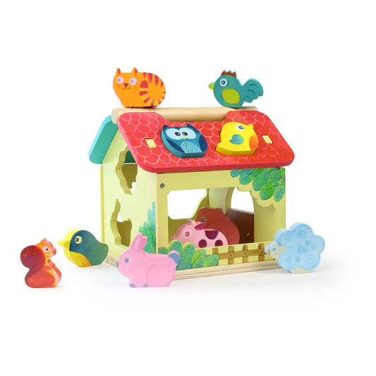 The Vilac Farm With Shapes is a vibrant wooden toy house with a red roof, designed with animal-shaped cutouts and including various animal figures such as a cat, bird, rabbit, cow, squirrel, and sheep. Some of these animals can be arranged on or around the house. Perfect for children aged 2 years and up, it serves as an engaging shape-sorting toy.