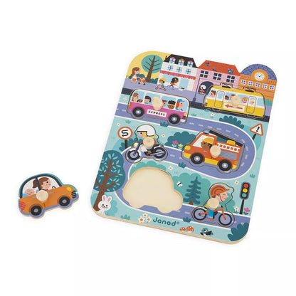 A picture of Janod In the Town Puzzle with a toy car.