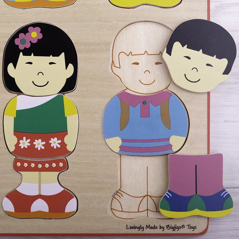 The Little Friends Puzzle is a chunky wooden toy featuring cartoon children. One child wears a floral dress, while another comes with separate head and leg pieces. The bright and simple puzzle board and pieces make it perfect as toddler toys.