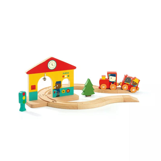 A Djeco Mini Train set with a clock on the top of it.
