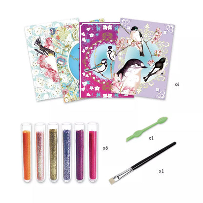 A set of four Djeco Birds Glitter Boards with glitter pens.